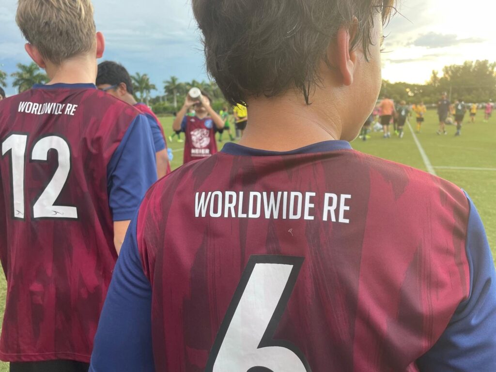Team Roma players in Worldwide Re sponsored jerseys